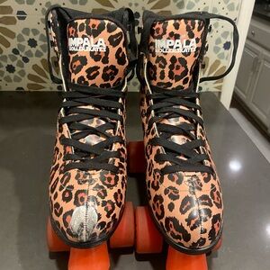 Women’s size 9 impala roller skates, leopard base with red heels